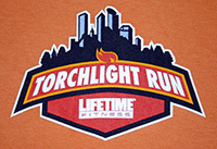 The logo for the 2006 LifeTime Fitness Torchlight run, a picture taken on the t-shirt I received at the end of the run.